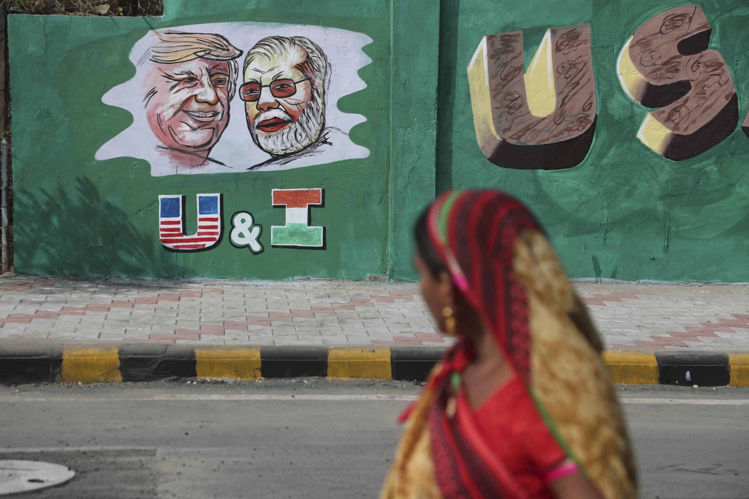 India builds 1,640ft wall along slum ahead of Trump visit