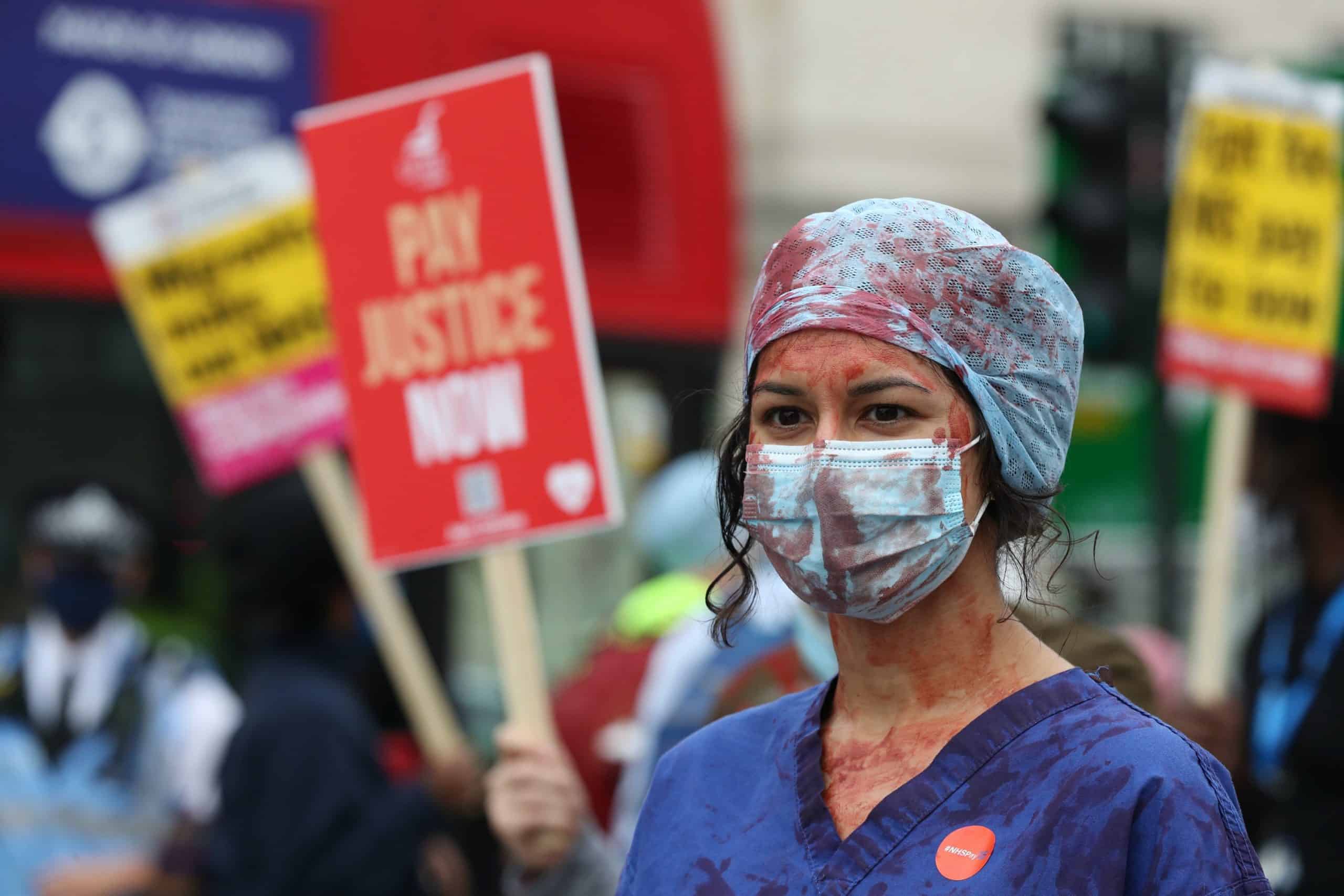 Boris Johnson branded a “joke” and a “hypocrite” as NHS workers protest outside Downing Street