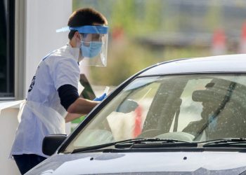 Samples are taken at a coronavirus testing facility in Temple Green Park and Ride, Leeds, as NHS Test and Trace - seen as key to easing the lockdown restrictions - is rolled out across England.