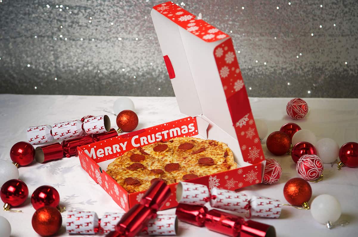 Pizza box that plays festive jingle rolled out for Brits who order takeaway on Christmas Day