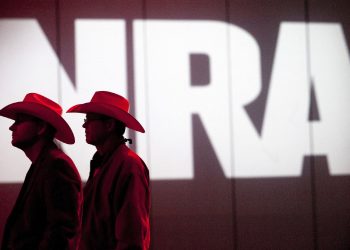 In this May 4, 2013, file photo, National Rifle Association members listen to speakers during the NRA's Annual Meetings and Exhibits at the George R. Brown Convention Center in Houston. (Johnny Hanson/Houston Chronicle via AP, File)