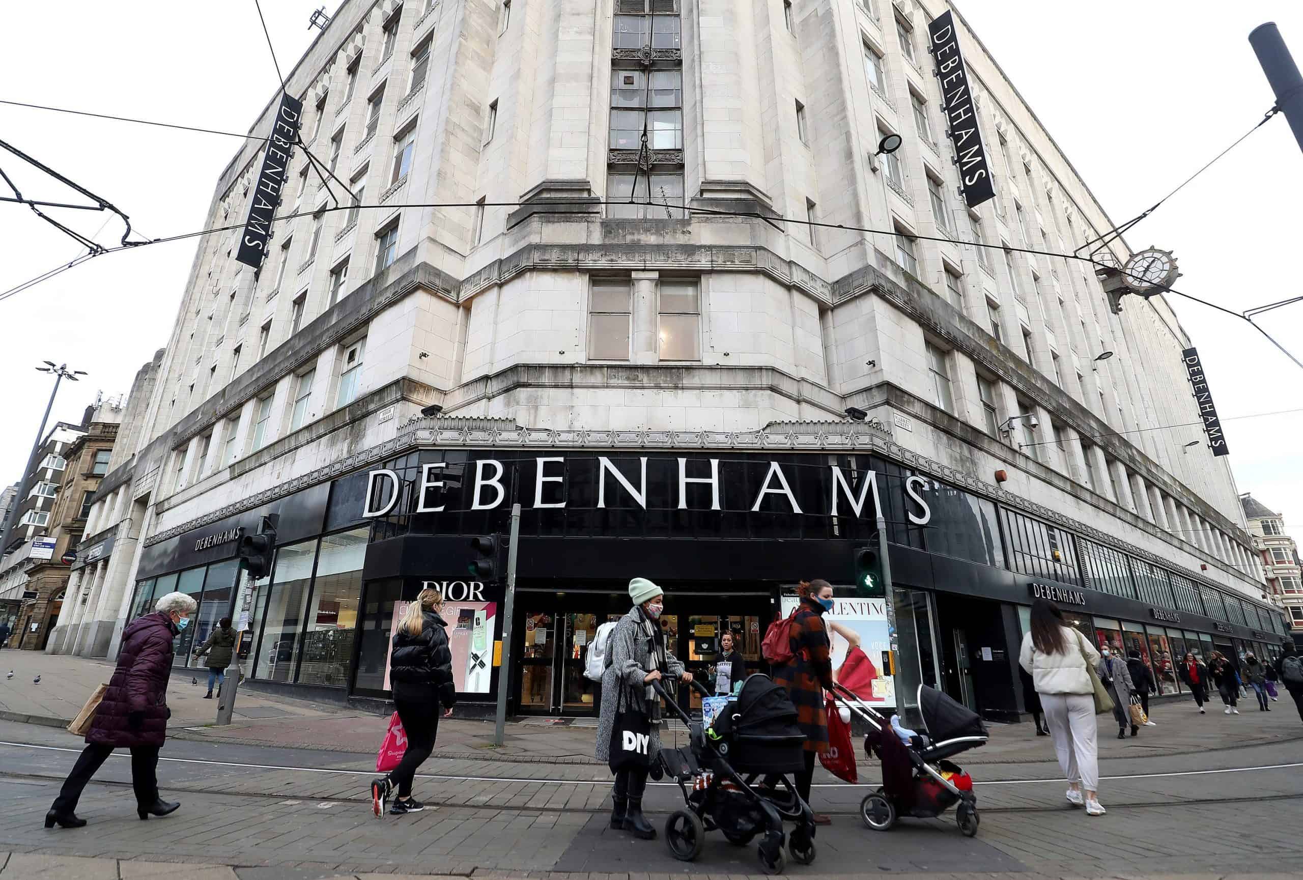 Scandal-hit retailer Boohoo buys Debenhams, putting 12,000 jobs at risk