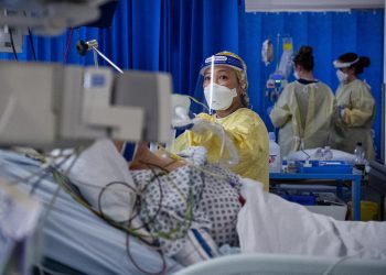 A nurse works on a patient in the ICU (Intensive Care Unit) in St George's Hospital in Tooting, south-west London, where the number of intensive care beds for the critically sick has had to be increased from 60 to 120, the vast majority of which are for coronavirus patients.