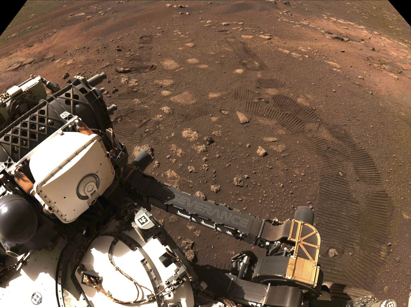 Nasa’s groundbreaking Mars rover hits the dusty red road in first trip