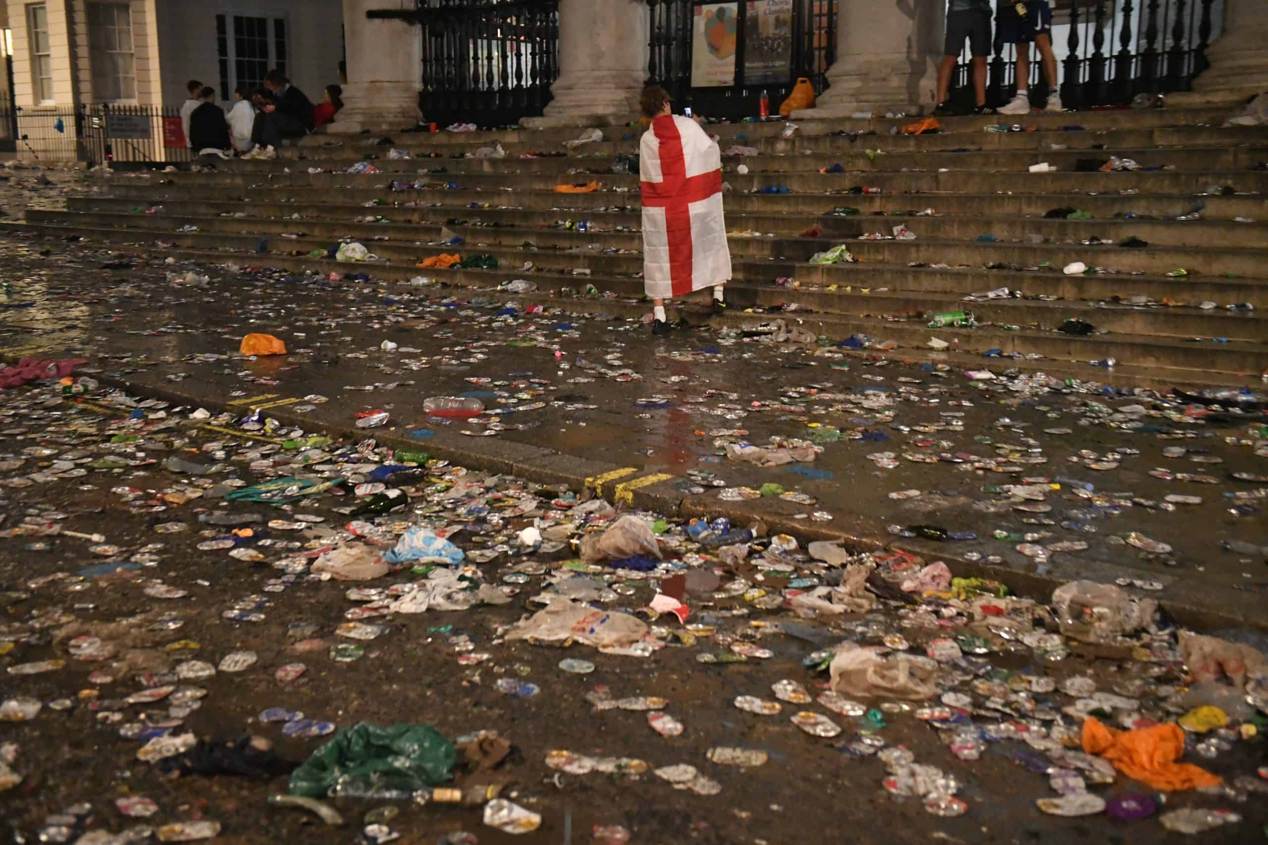 In Pictures: Big clean-up begins after football fans head home