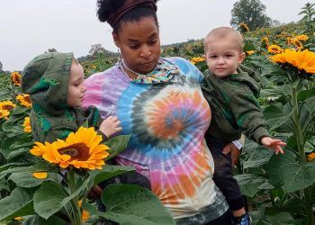 Jennifer with Brayden left and Trevor right. Credit;SWNS