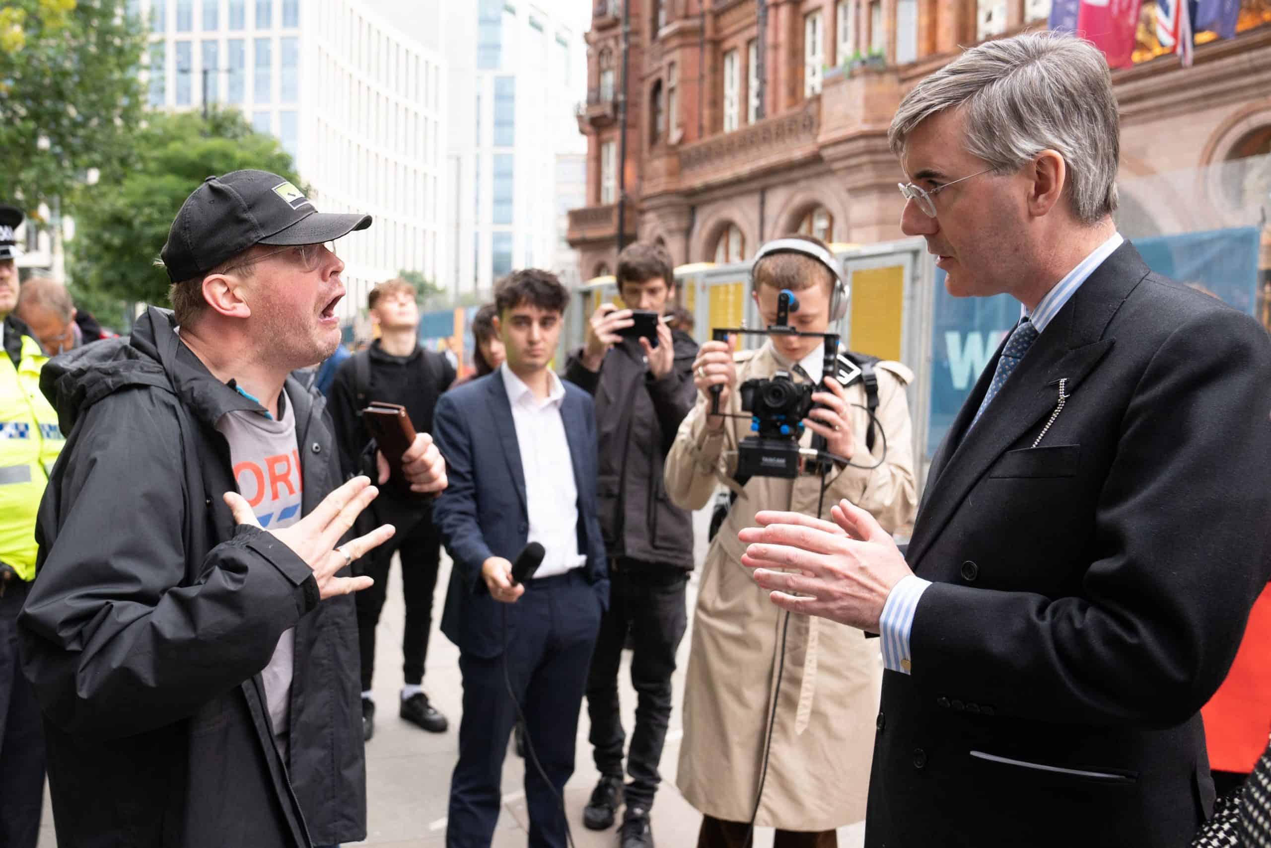 Watch: Disability campaigner confronts ‘shameful’ Jacob Rees-Mogg in street