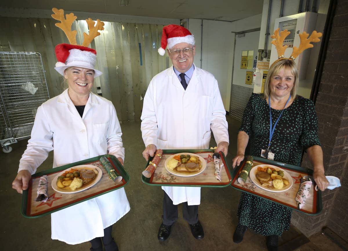 Catering staff are getting ready to serve up Xmas dinner to hospital patients