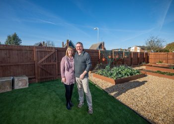 Lee and Kirstie Lawes in thier garden at their home. Credit;SWNS