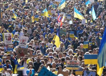 People take part in a solidarity march in London for Ukraine, following the Russian invasion. Picture date: Saturday March 26, 2022.