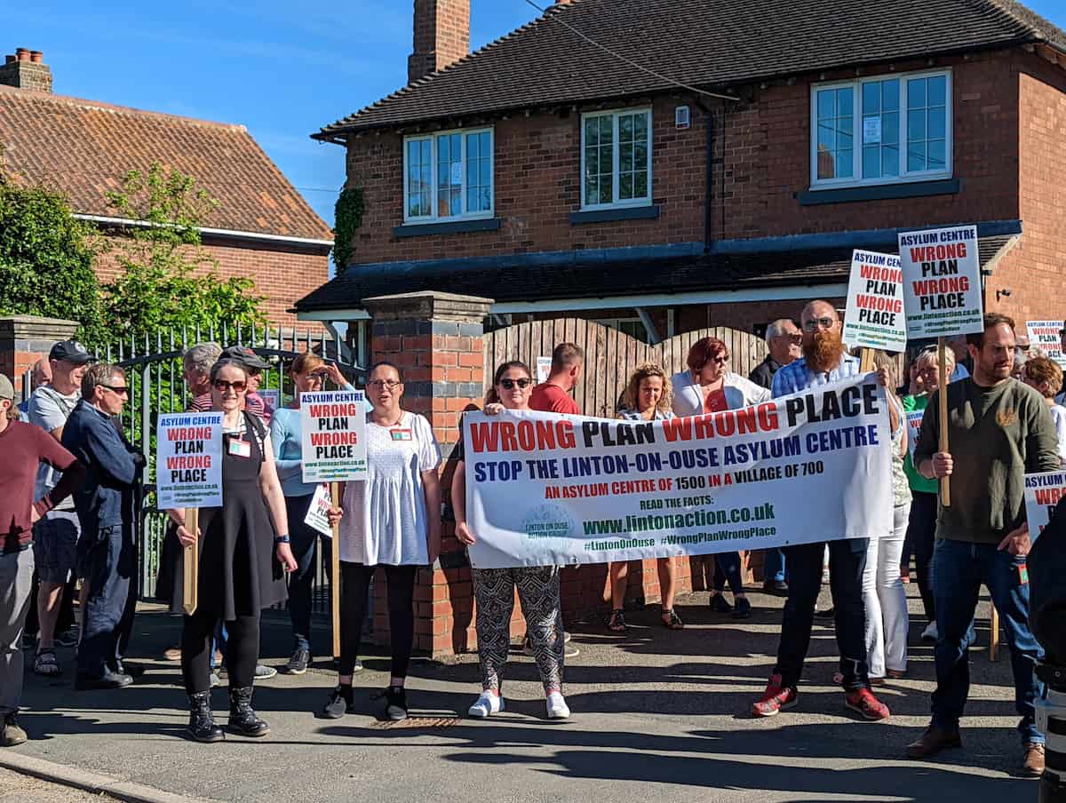 Furious residents taken to streets to protest plans to house asylum seekers in village