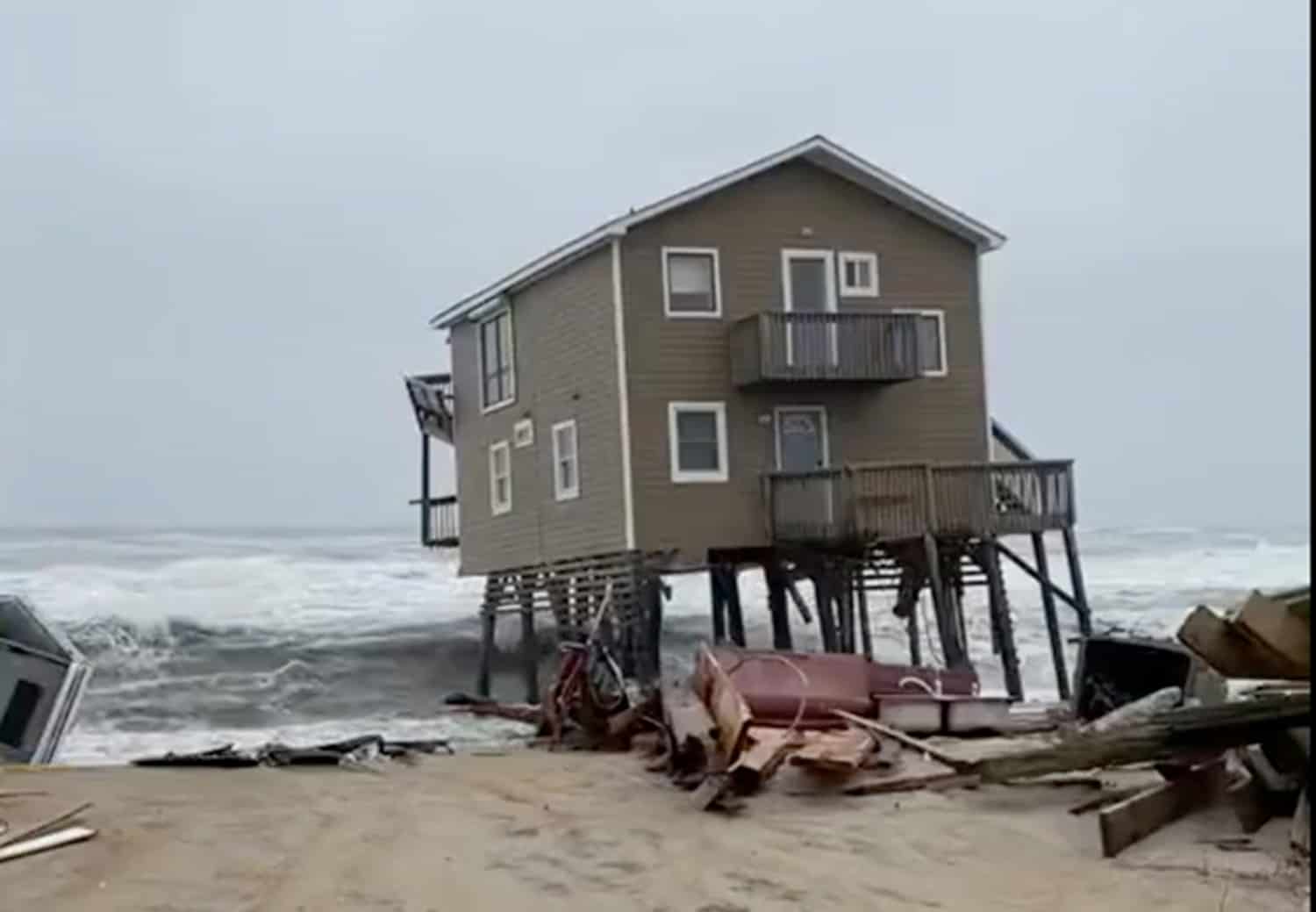 Watch: House collapses and drifts into the ocean in America