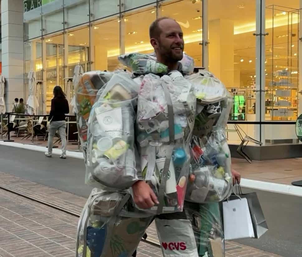 Watch: Trashion show? Activist wears all his own rubbish for an entire month