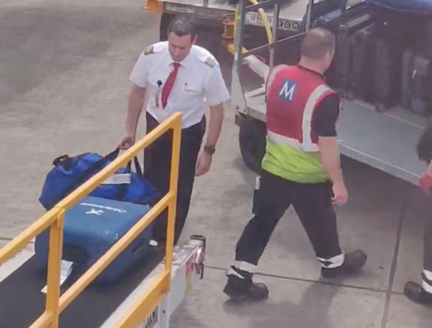 Pilot helps load luggage onto plane as baggage crisis grounds flights