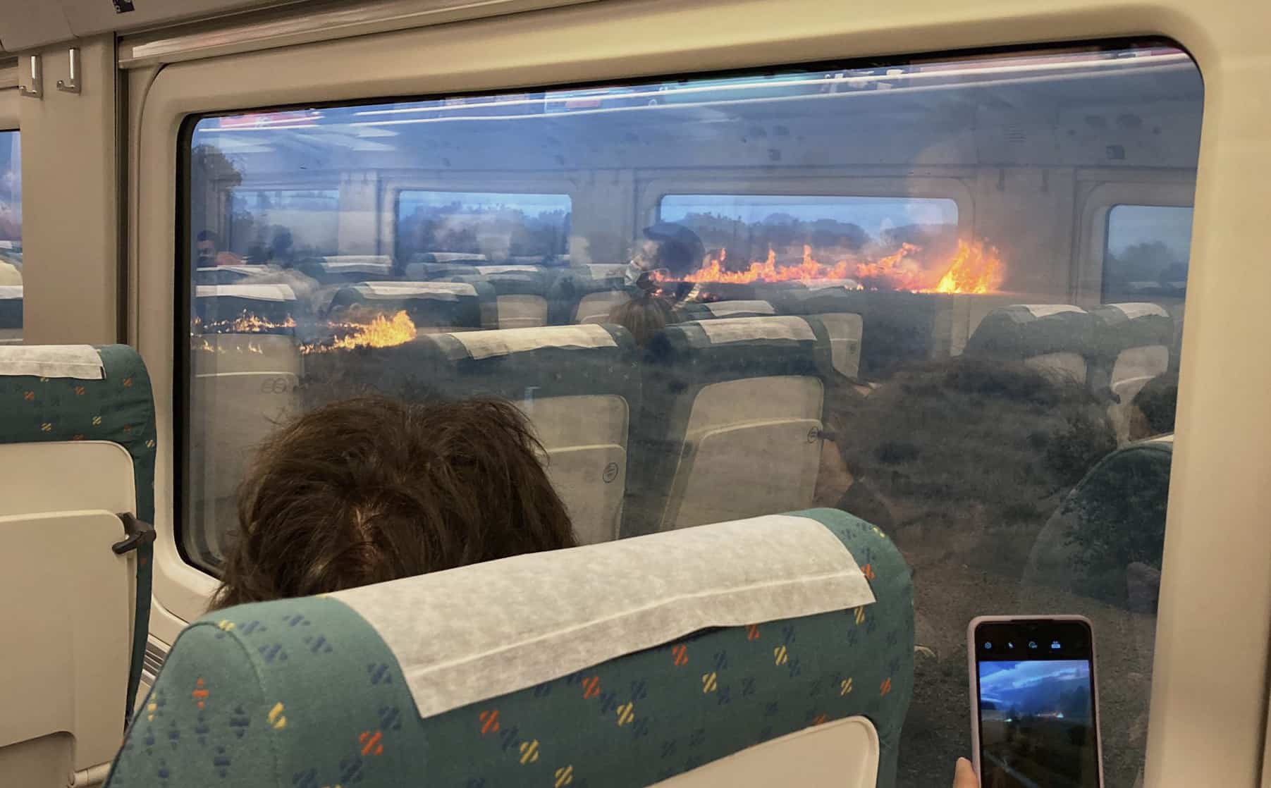 Watch: Apocalyptical scenes as train stops in middle of wildfire