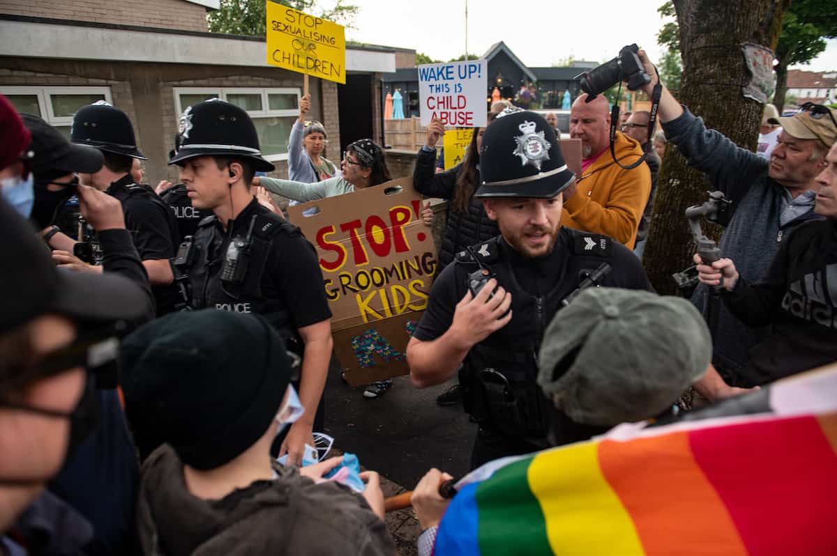 Pride group slam protestors outside book reading by Drag Queen at a library