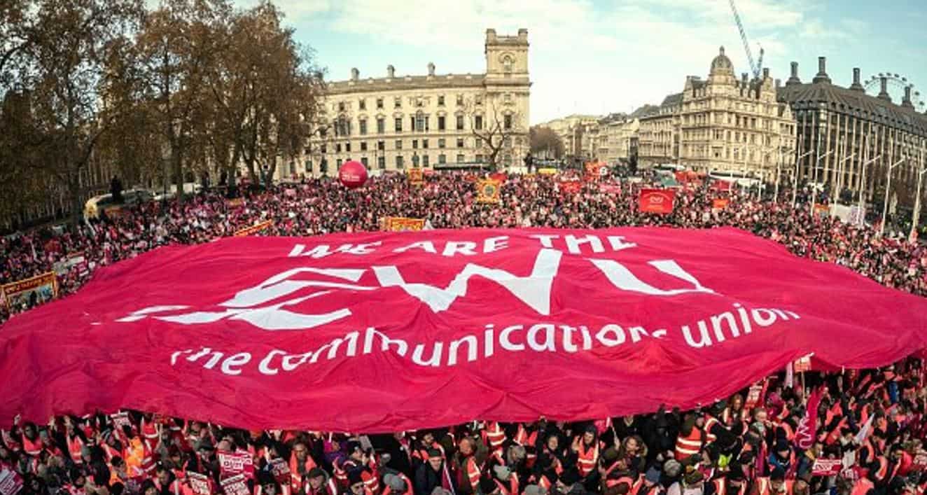 Thousands of Royal Mail workers hold rally outside Parliament