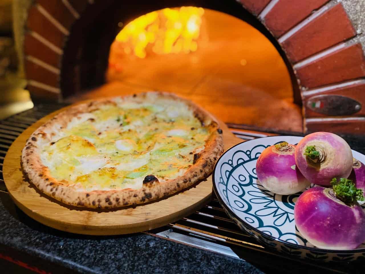 Pub starts serving pizza with turnip base amid tomato shortage