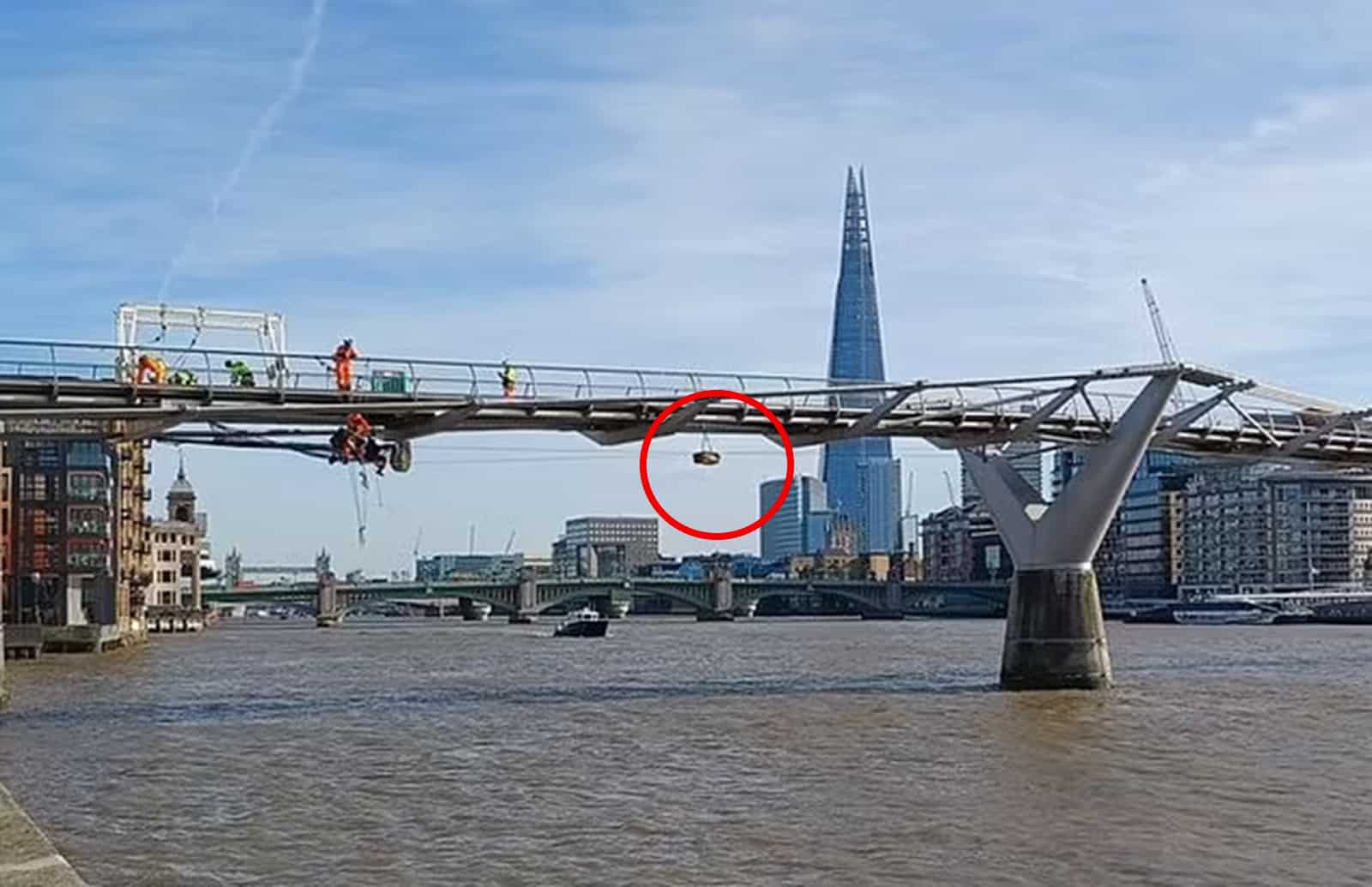 Millennium Bridge workers trigger ancient by-law requiring them to dangle bale of straw