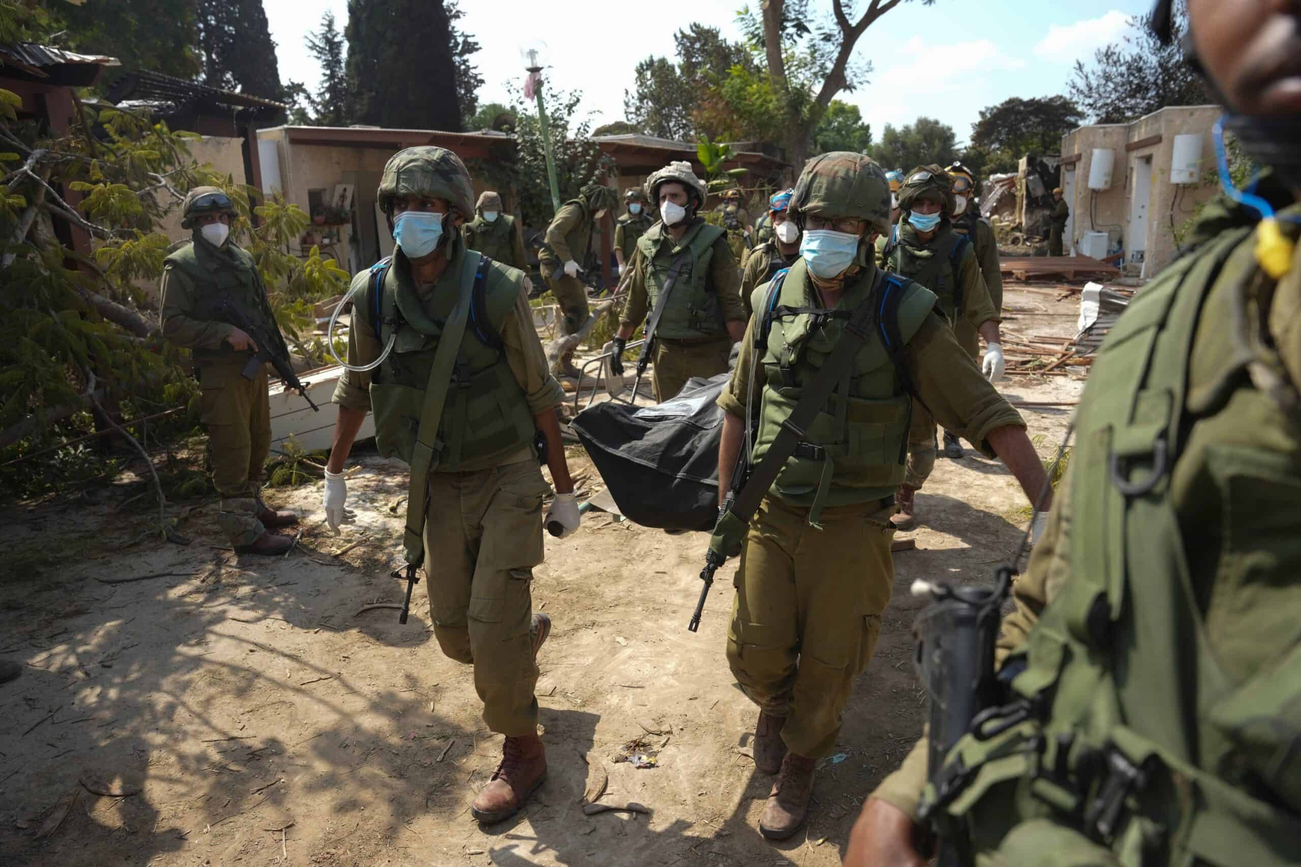 Israeli village near Gaza border lies in ruins, filled with bodies