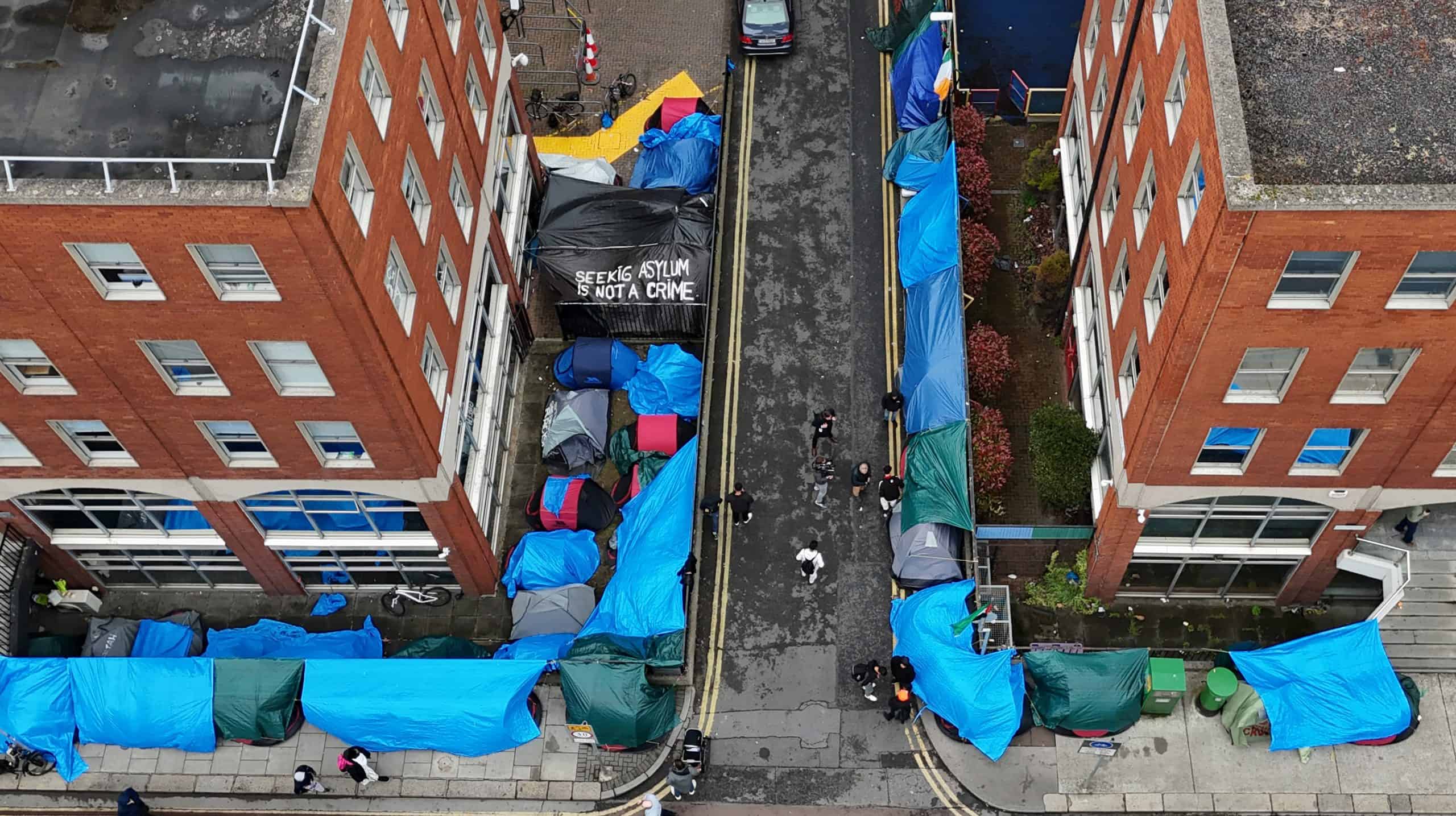 ‘Tent city’ appears on Dublin streets as UK and Irish ministers debate asylum returns