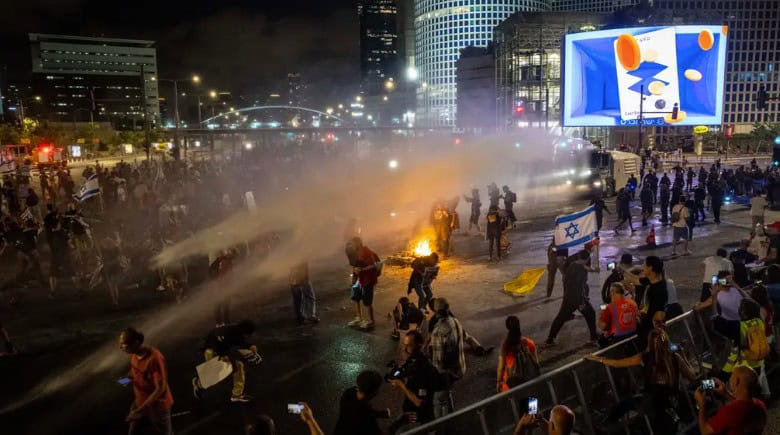 Israeli police scuffle with protesters in huge demo against Netanyahu government