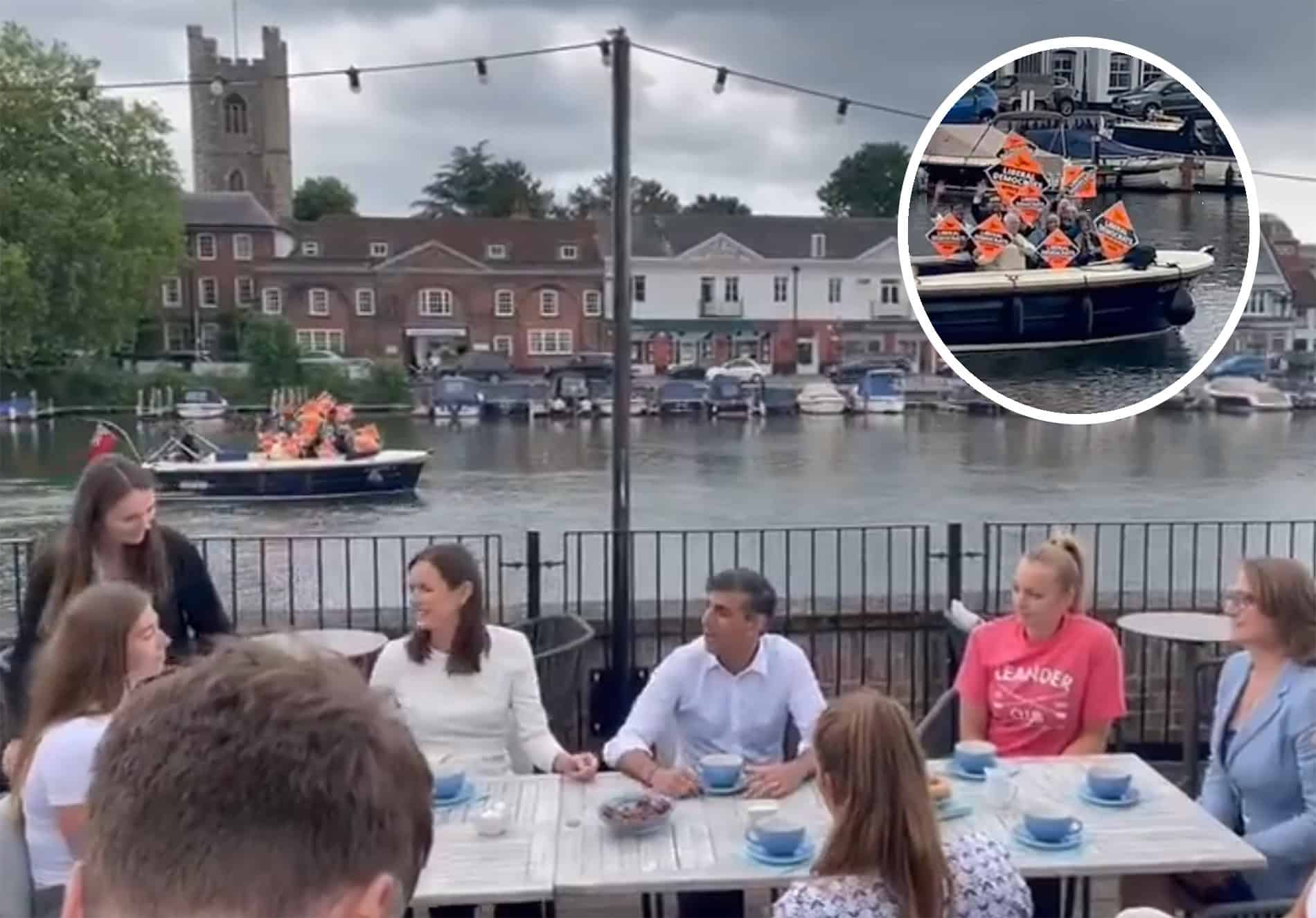 Sunak photobombed by Lib Dems on a boat in Henley