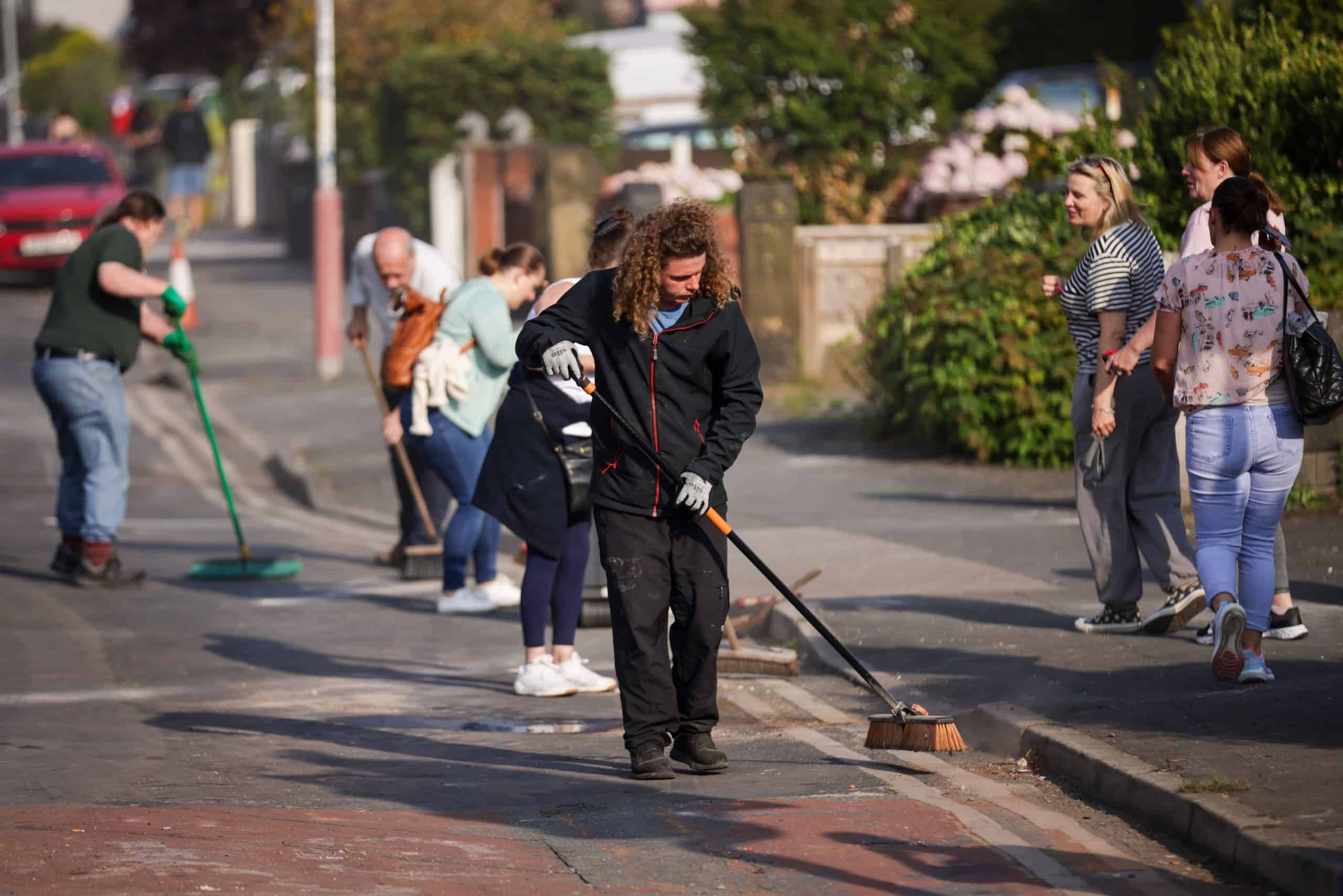 Locals clean up after ‘people from out of town cause mayhem’ in Southport