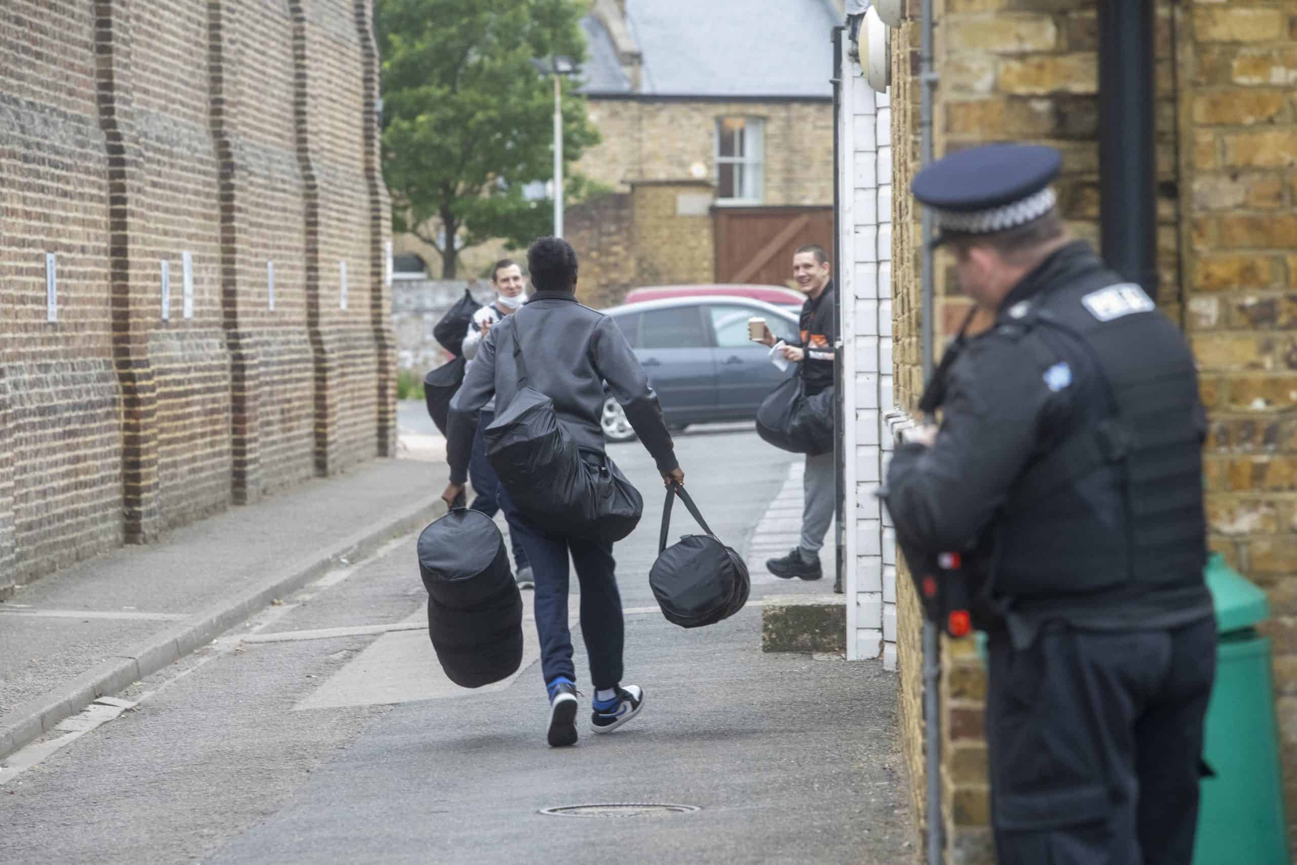 Jubilant crowds gather outside HMP Wandsworth as prisoners get out early